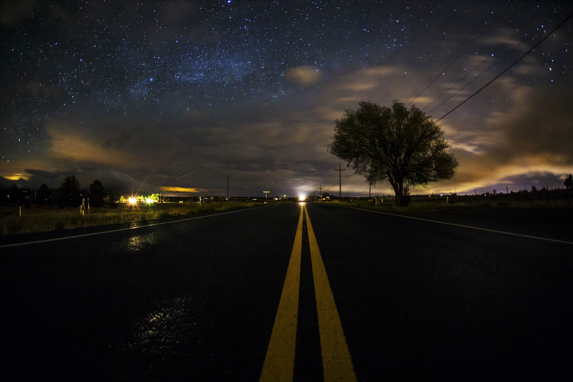 Milky Way Peeking From Behind The Clouds.jpg - undefined by Joey Onyxone Sandoval